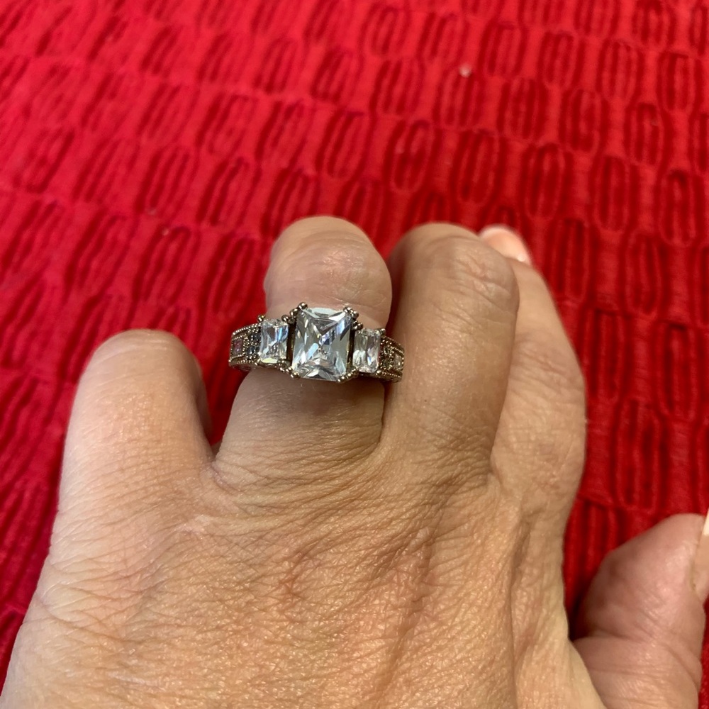 Ornate emerald cut lab created diamond ring